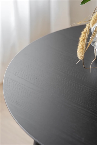 Rundt sort spisebord